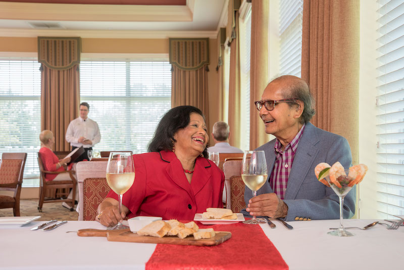 Couple eating dinner at The Village