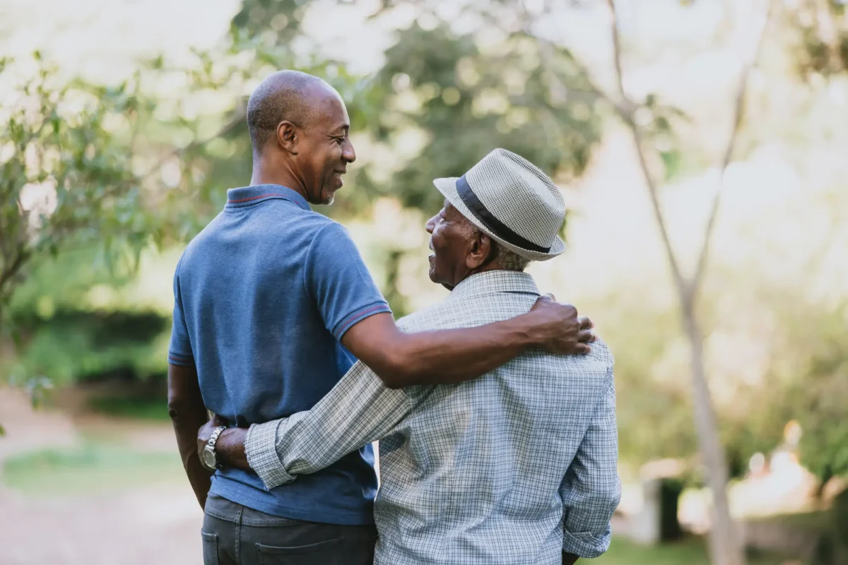 three generations of family members stroll through our independent senior living campus